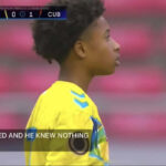 MJ", son of alumna Leisha Correia Day, on the soccer field representing the U.S. Virgin Islands.