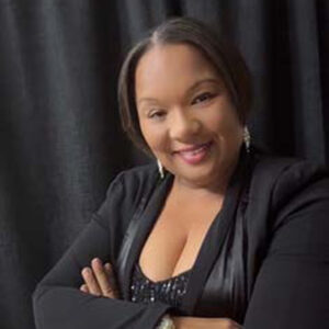 A professional headshot of Kyshama Montes-Belardo, owner of Island Bello LLC.